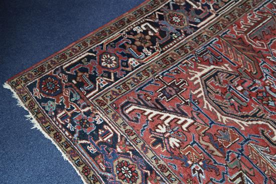 A Persian rug, 11ft 4in by 7ft 11in.